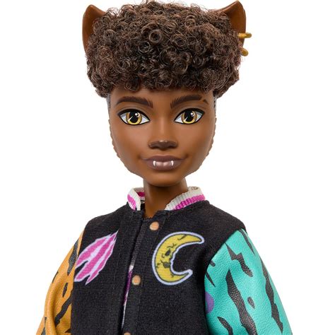 Clawd Wolf doll wears a clawed-up varsity jacket, graphic tee, and ripped jeans with sneakers. . Clawd wolf doll